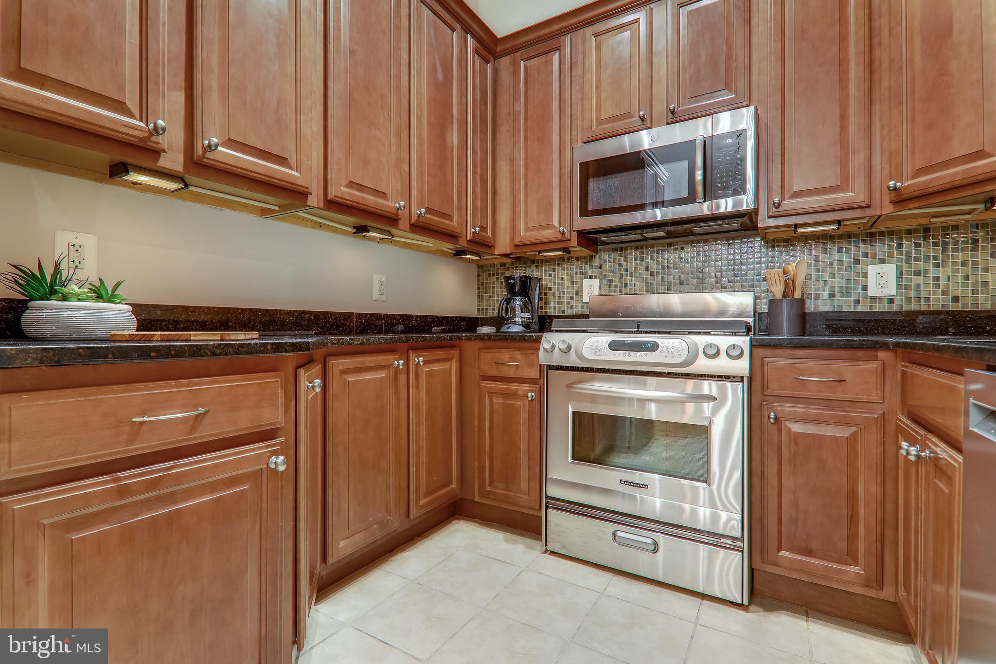 1438 Columbia Road Northwest, Unit 103 Washington, DC 20009 - Photo 16 of 39 Granite counters and lots of storage