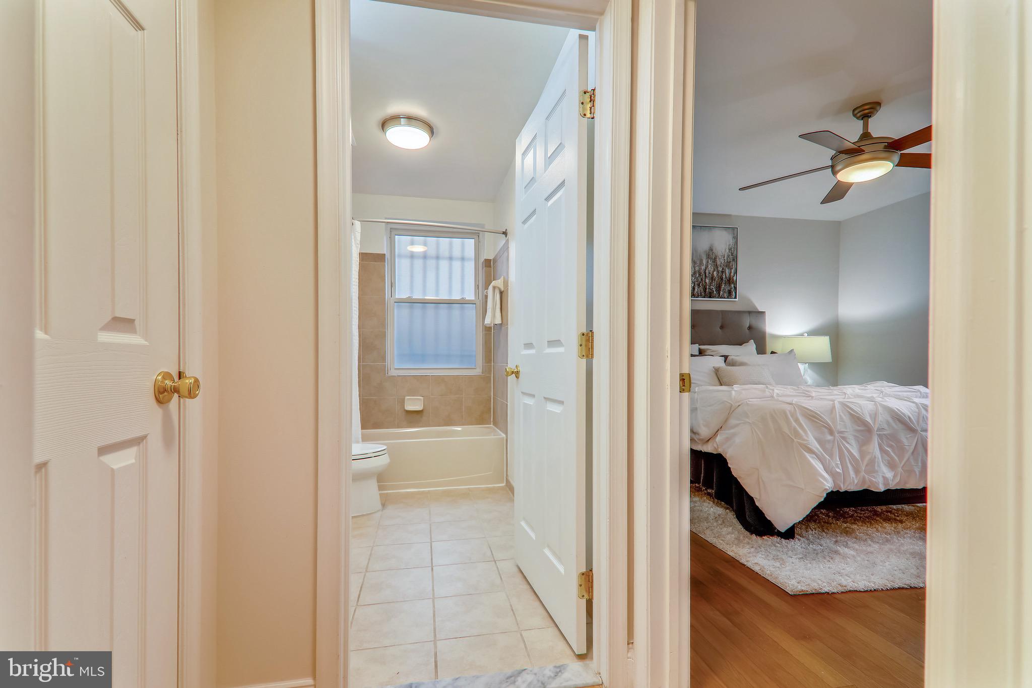 1438 Columbia Road Northwest, Unit 103 Washington, DC 20009 - Photo 24 of 39 View to primary bedroom with bathroom