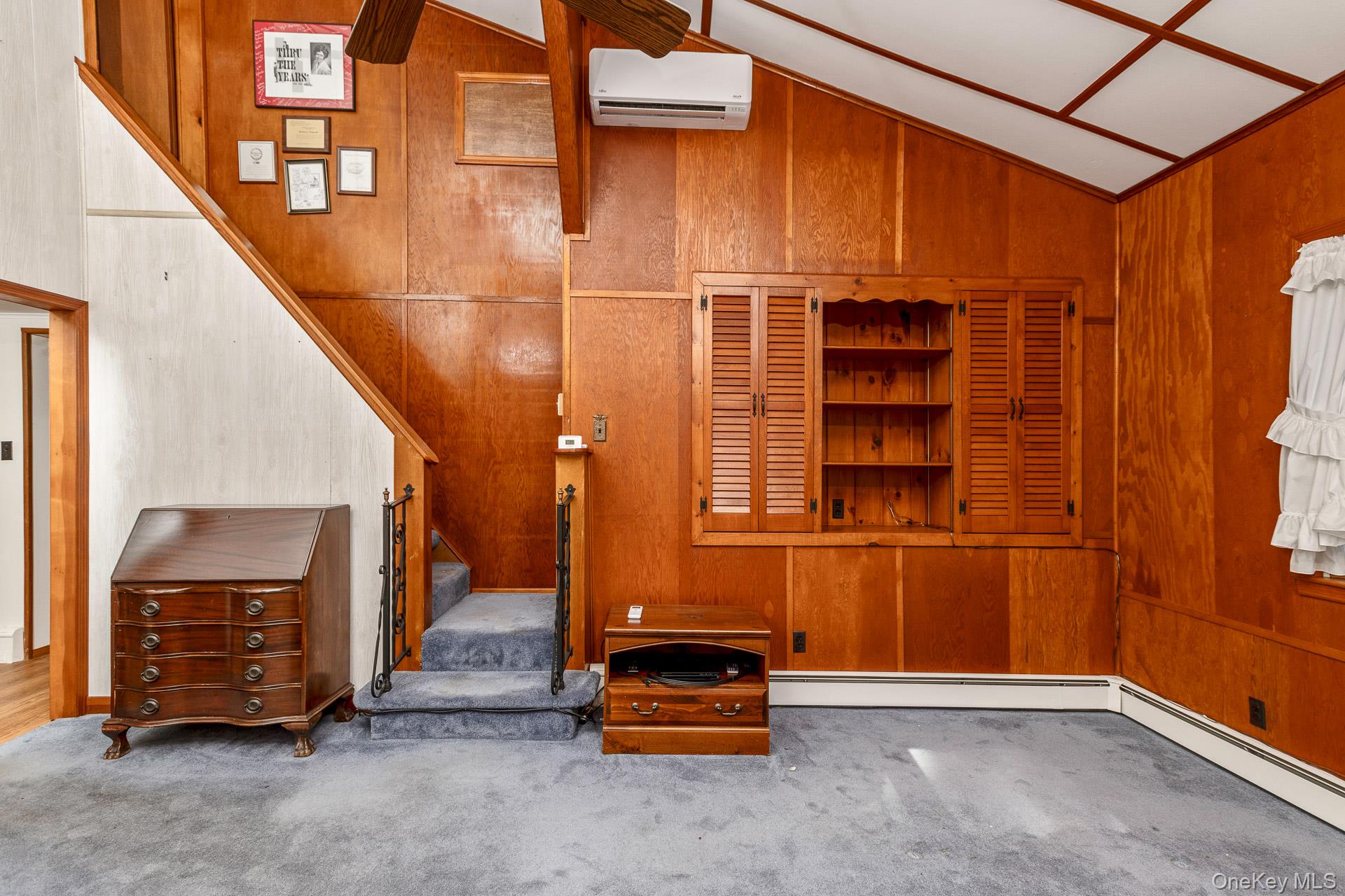 261 Elm Road West Mastic Beach, NY 11951 - Photo 14 of 22 a view of an empty room with a fireplace