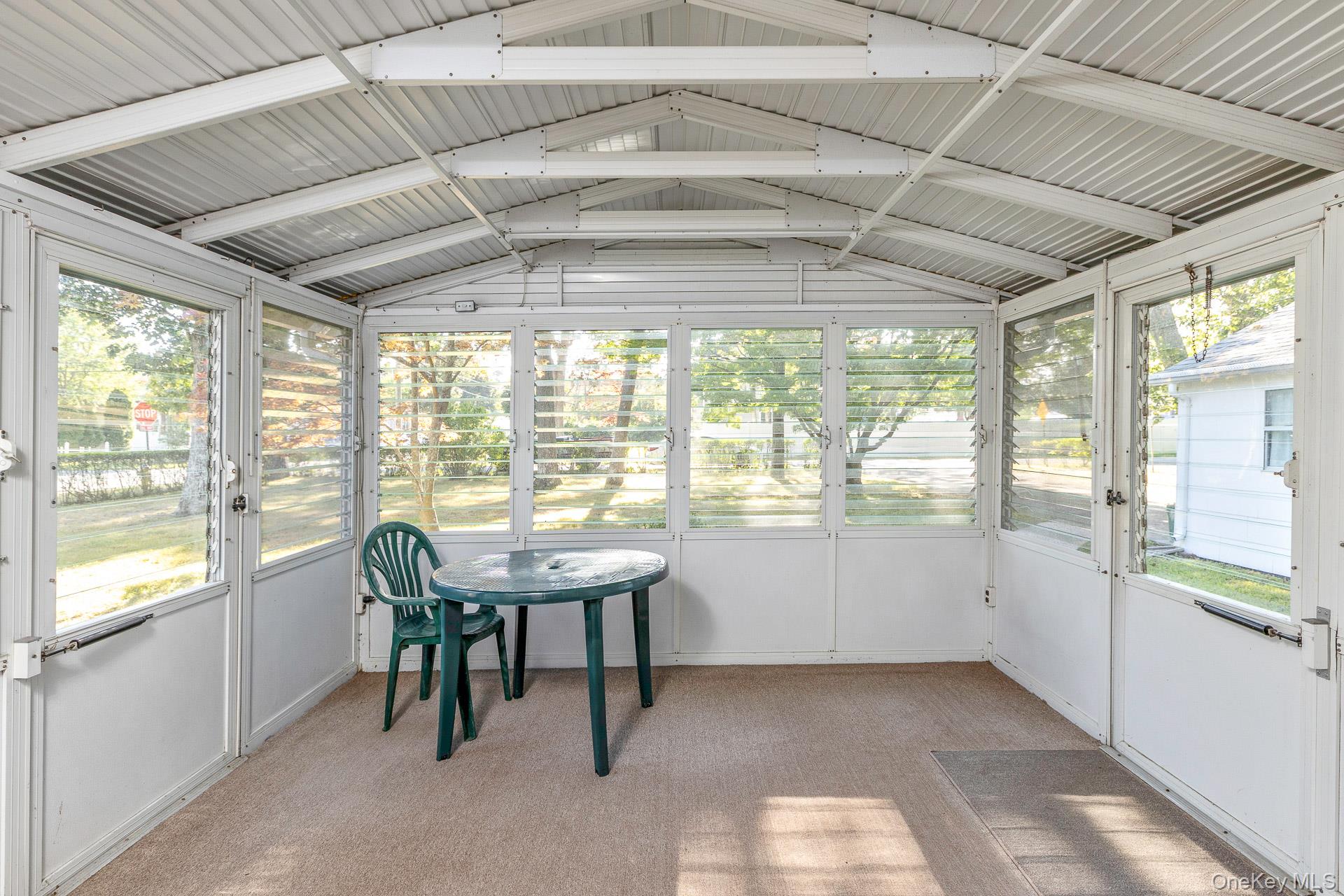261 Elm Road West Mastic Beach, NY 11951 - Photo 5 of 22 a room with a large window