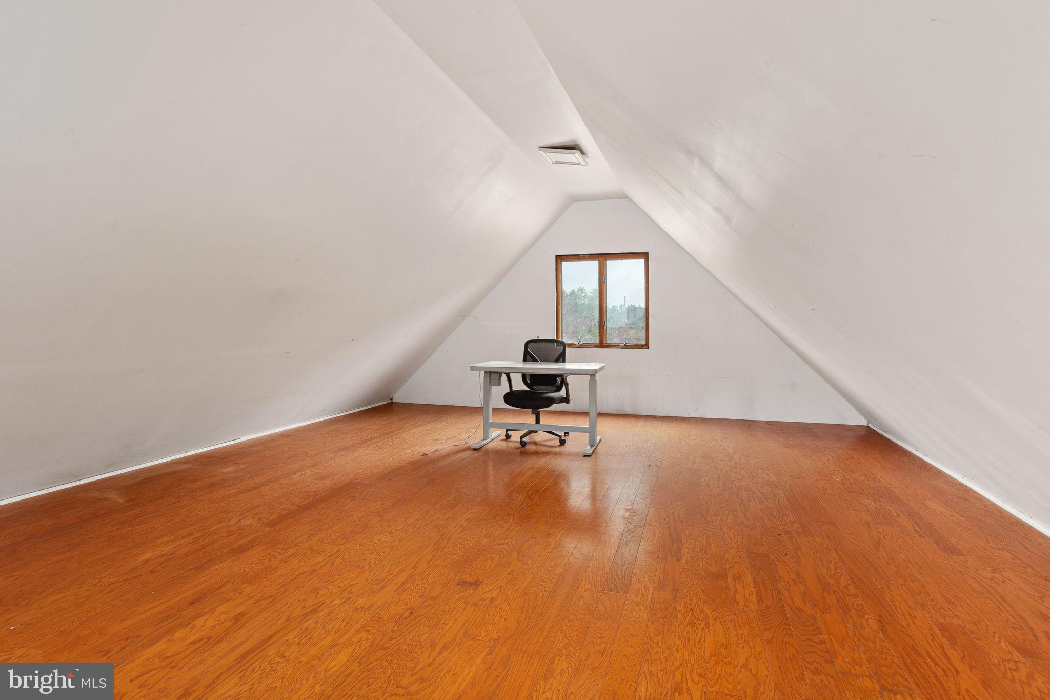6119 Beach Road Midland, VA 22728 - Photo 59 of 98 a view of a room with gym equipment and wooden floor