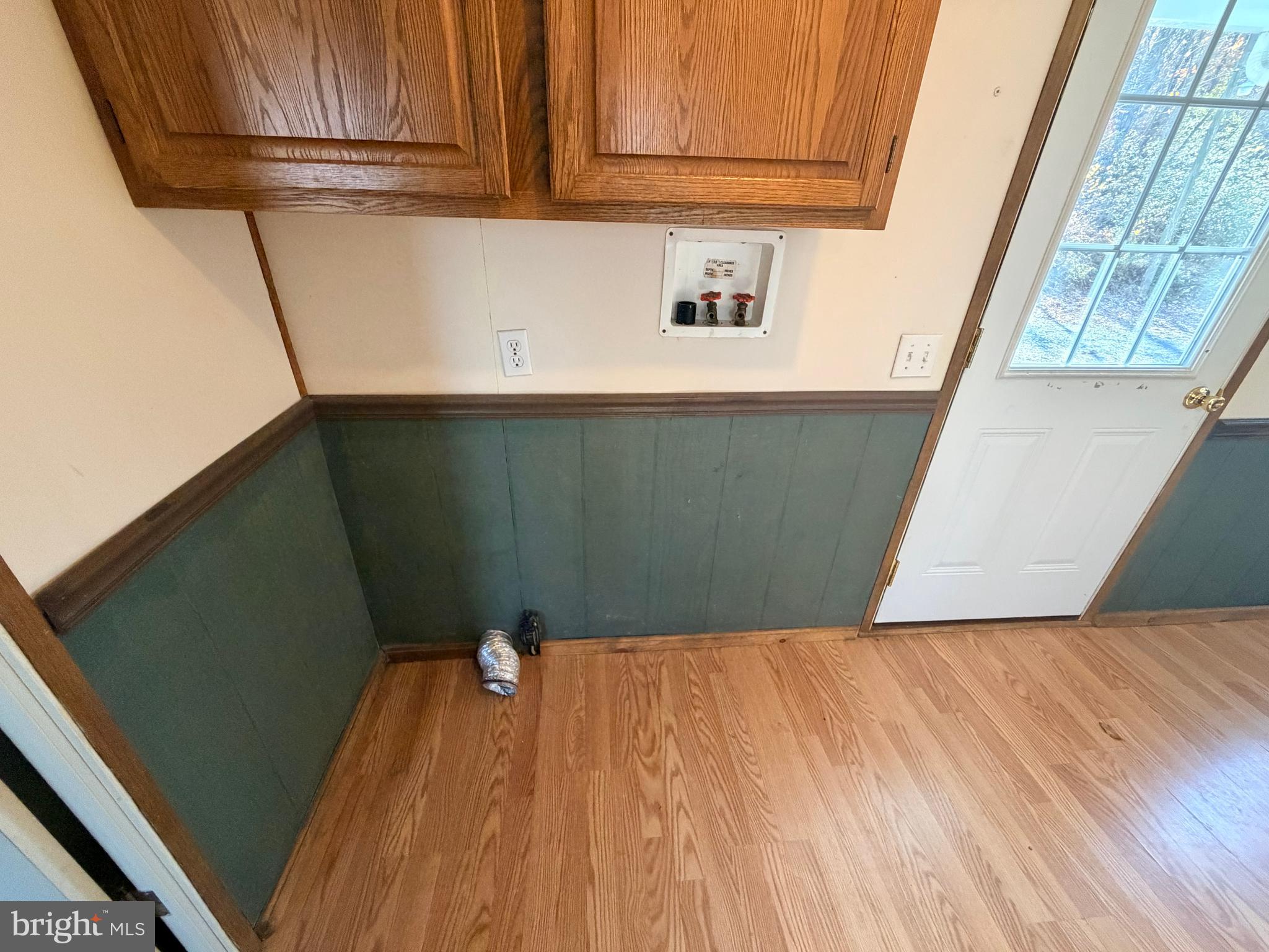 451 Upper Bailey Road Newport, PA 17074 - Photo 12 of 25 a view of a air conditioner and an empty room with wooden floor