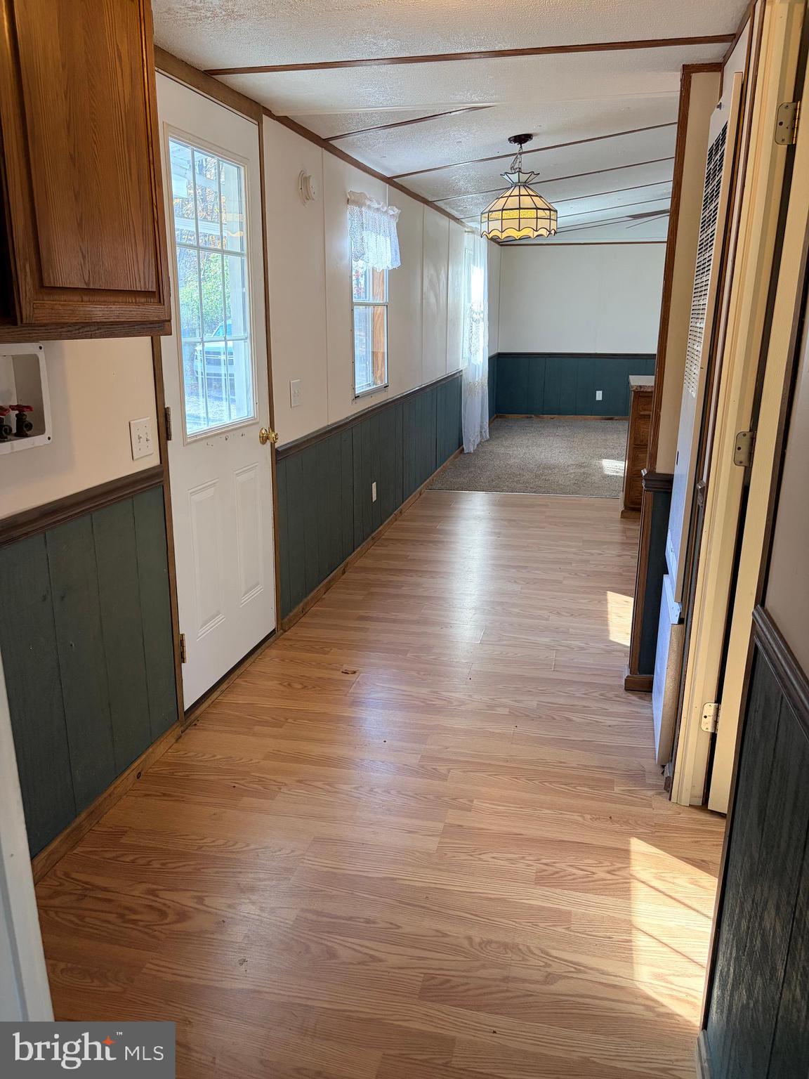 451 Upper Bailey Road Newport, PA 17074 - Photo 13 of 25 a view of hallway with stairs and wooden floor