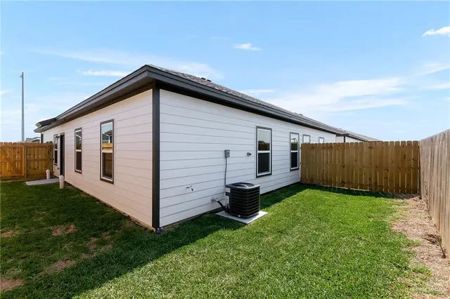 a view of a back yard of the house