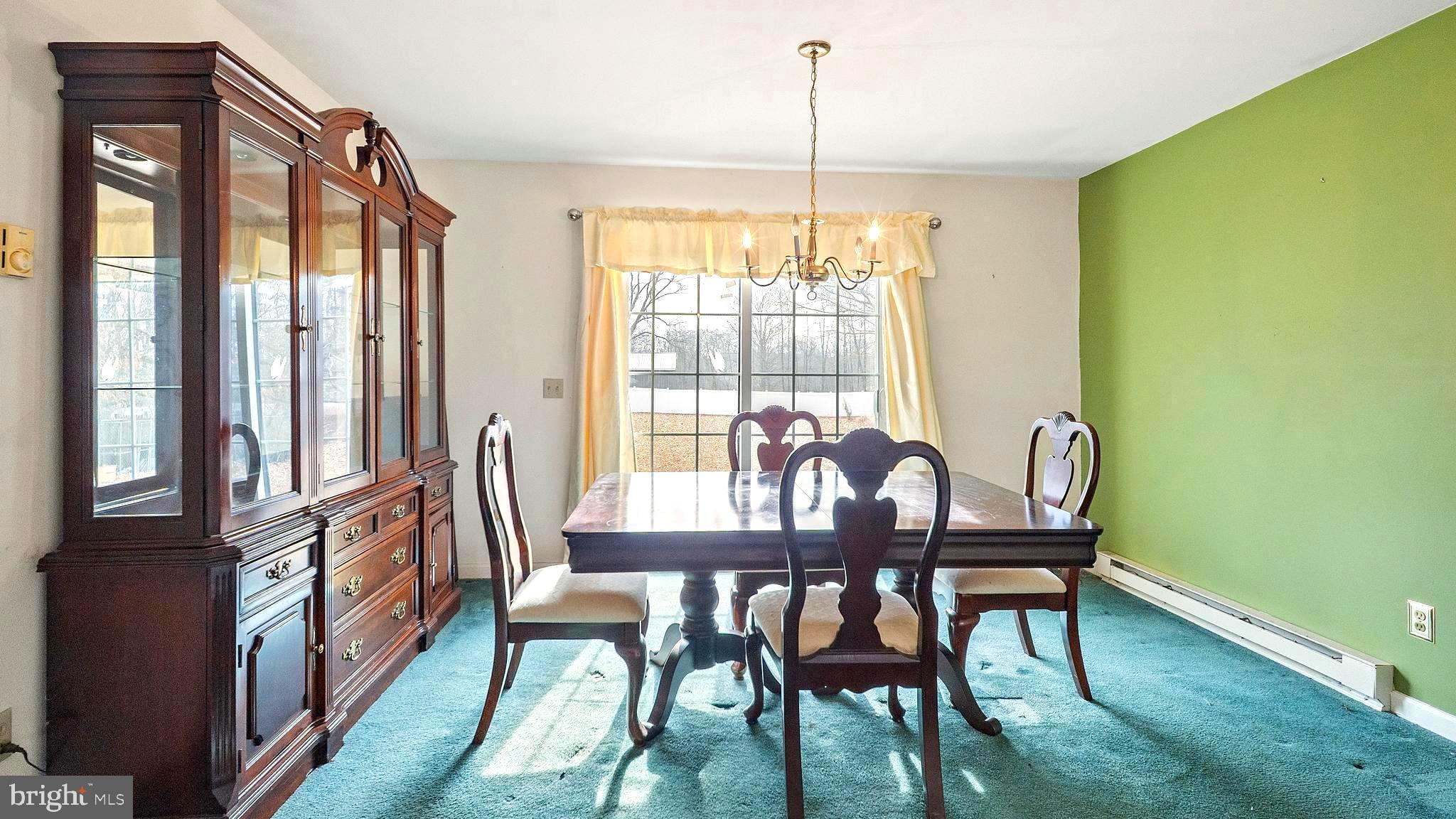 34157 Somerset Road Pocomoke City, MD 21851 - Photo 11 of 39 a view of a dining room with furniture window and outside view