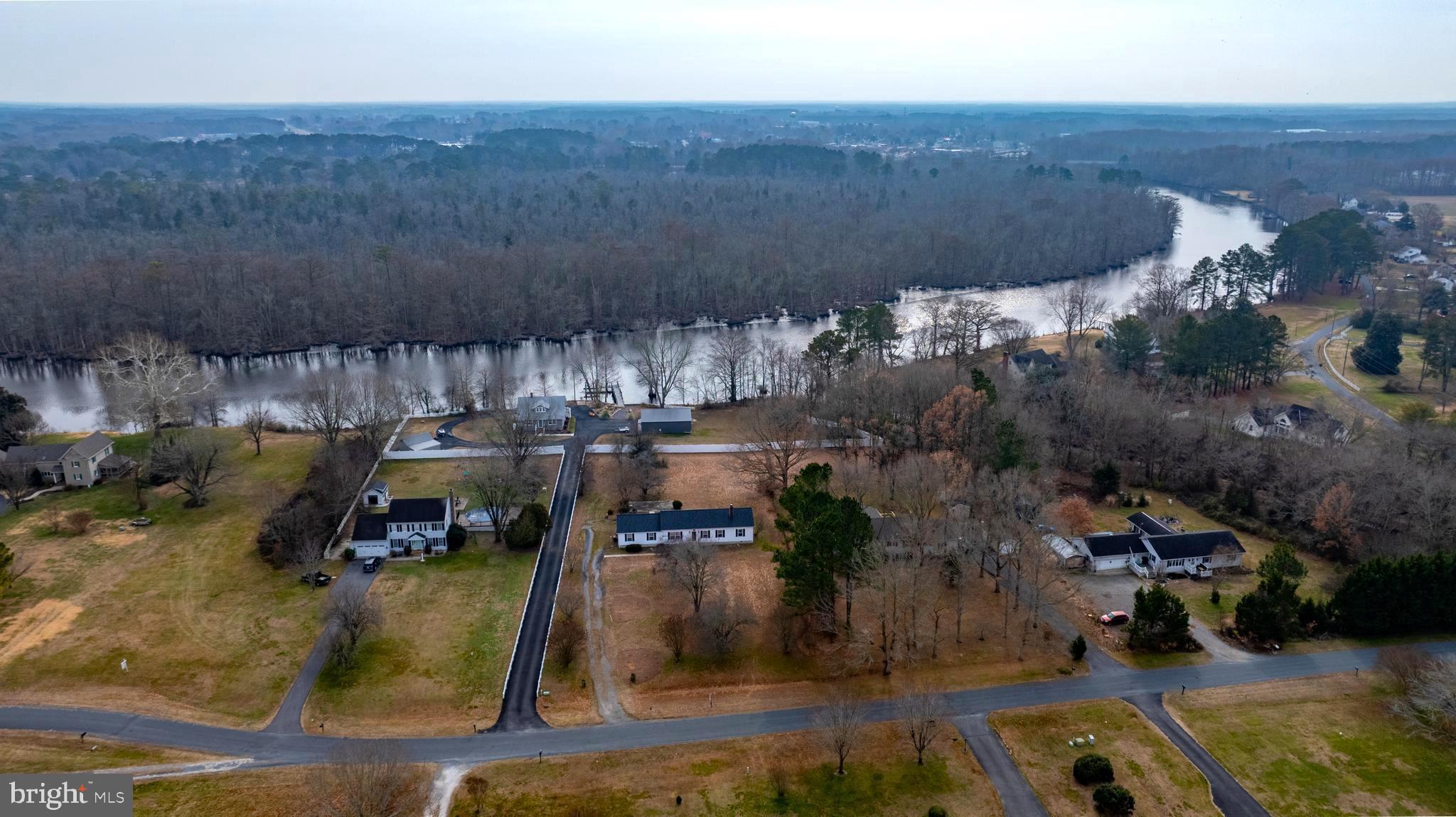 34157 Somerset Road Pocomoke City, MD 21851 - Photo 25 of 39 an aerial view of residential houses with outdoor space