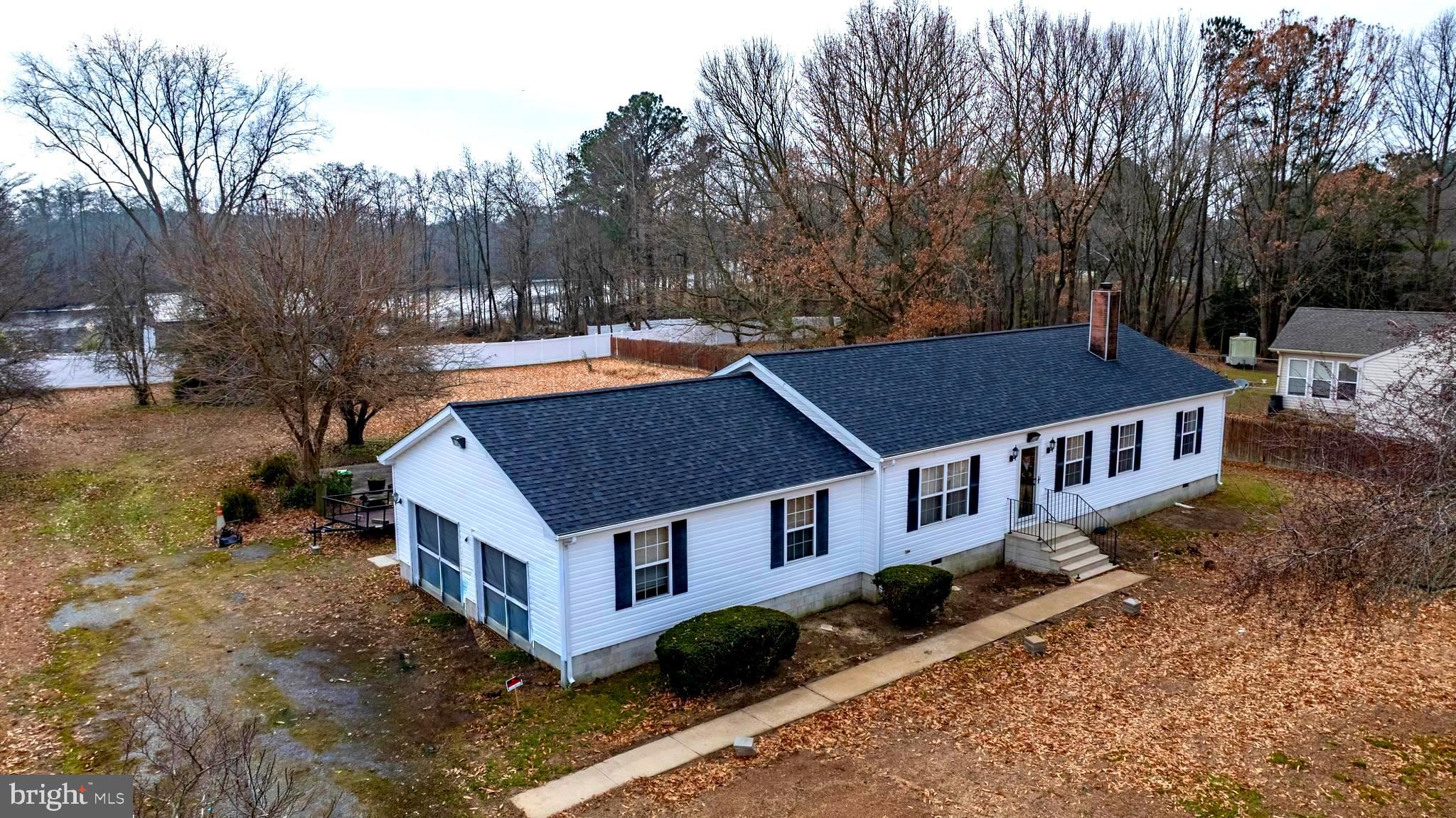 34157 Somerset Road Pocomoke City, MD 21851 - Photo 3 of 39 a aerial view of a house with a yard