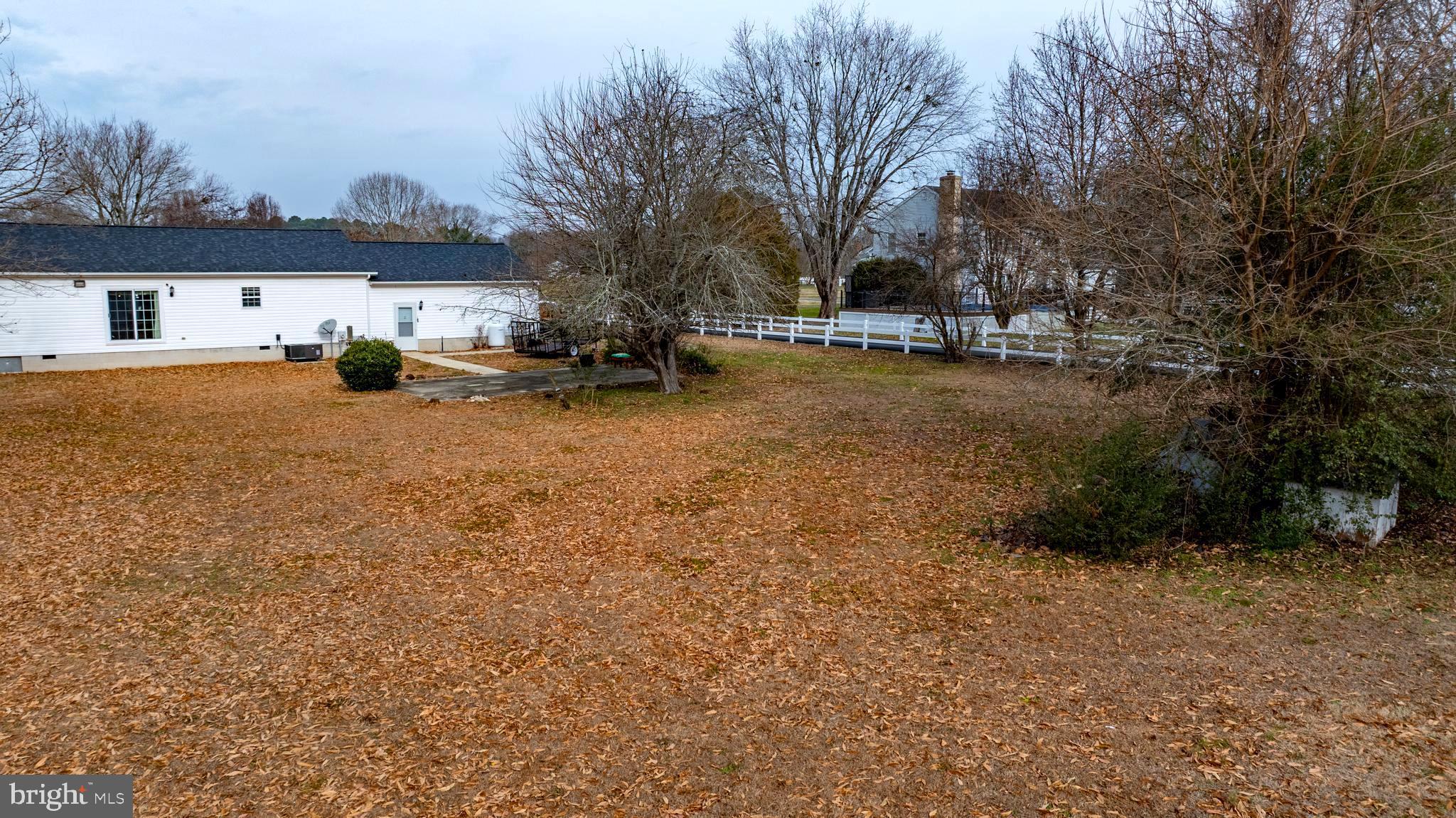 34157 Somerset Road Pocomoke City, MD 21851 - Photo 39 of 39 a view of house with outdoor space and trees in the background
