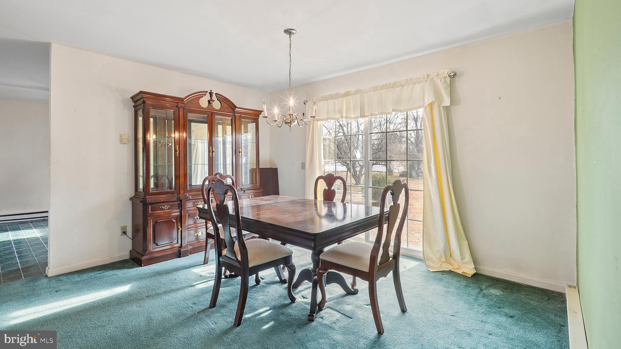 34157 Somerset Road Pocomoke City, MD 21851 - Photo 10 of 39 a view of a dining room with furniture and window