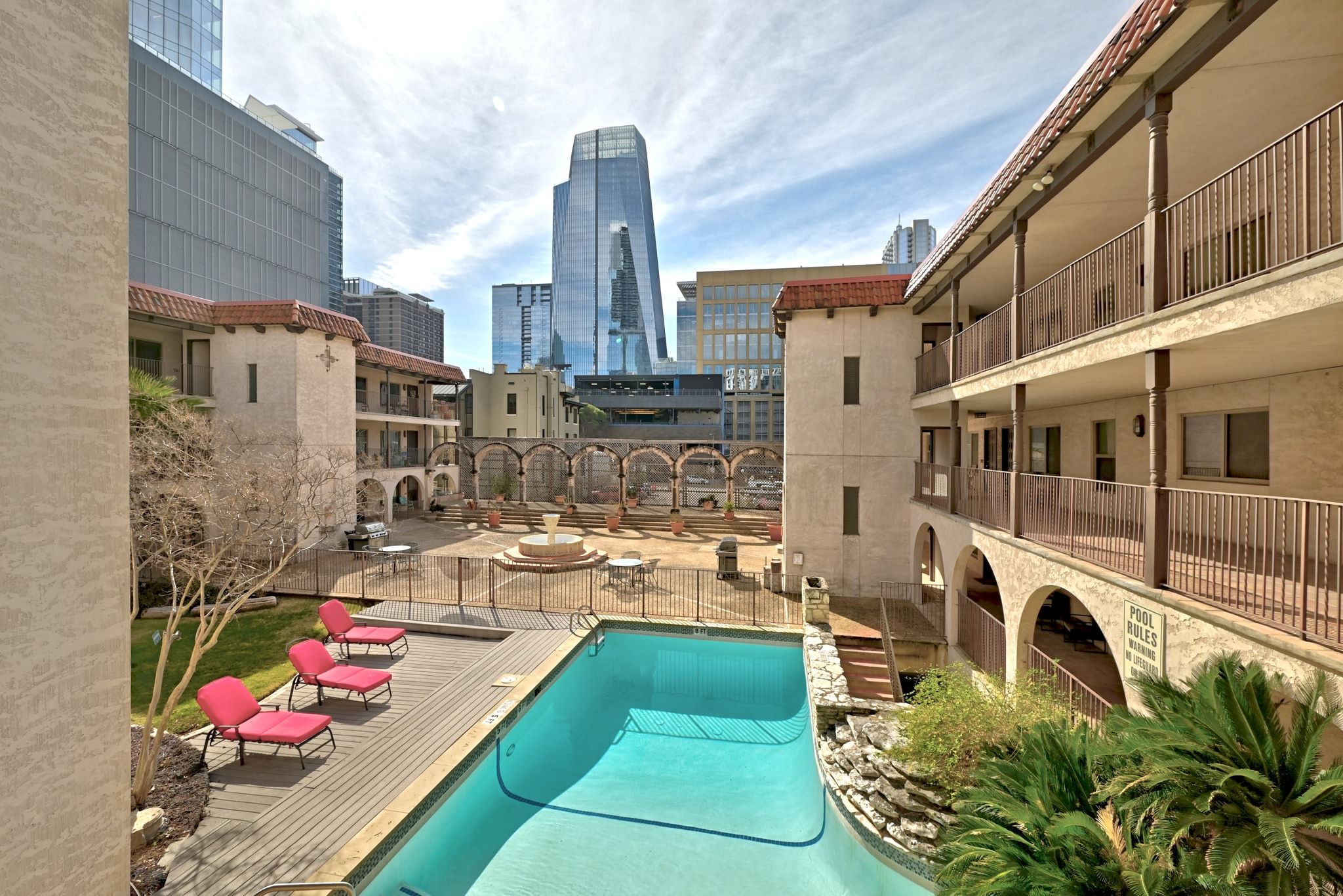 505 West 7th Street, Unit 106 Austin, TX 78701 - Photo 20 of 21 Community pool with a view of skyline and a patio