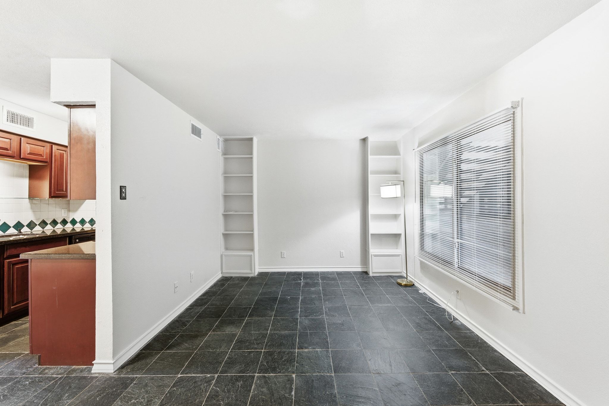 505 West 7th Street, Unit 106 Austin, TX 78701 - Photo 3 of 21 Spare room with baseboards