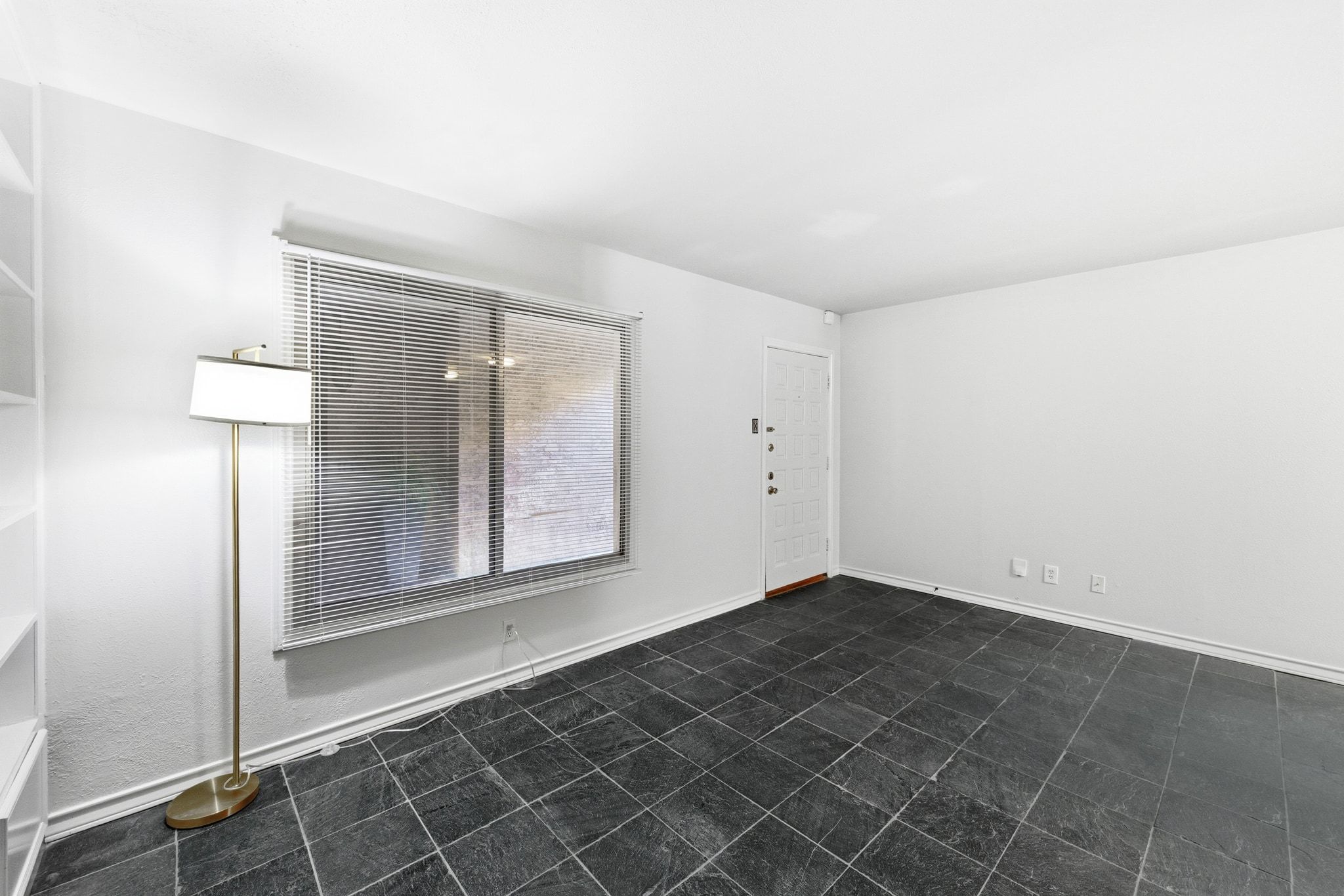 505 West 7th Street, Unit 106 Austin, TX 78701 - Photo 5 of 21 Unfurnished room with baseboards