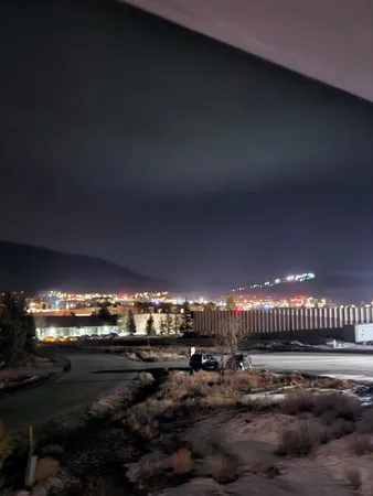 a car parked in front of a house