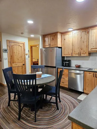 a view of a dining room with furniture