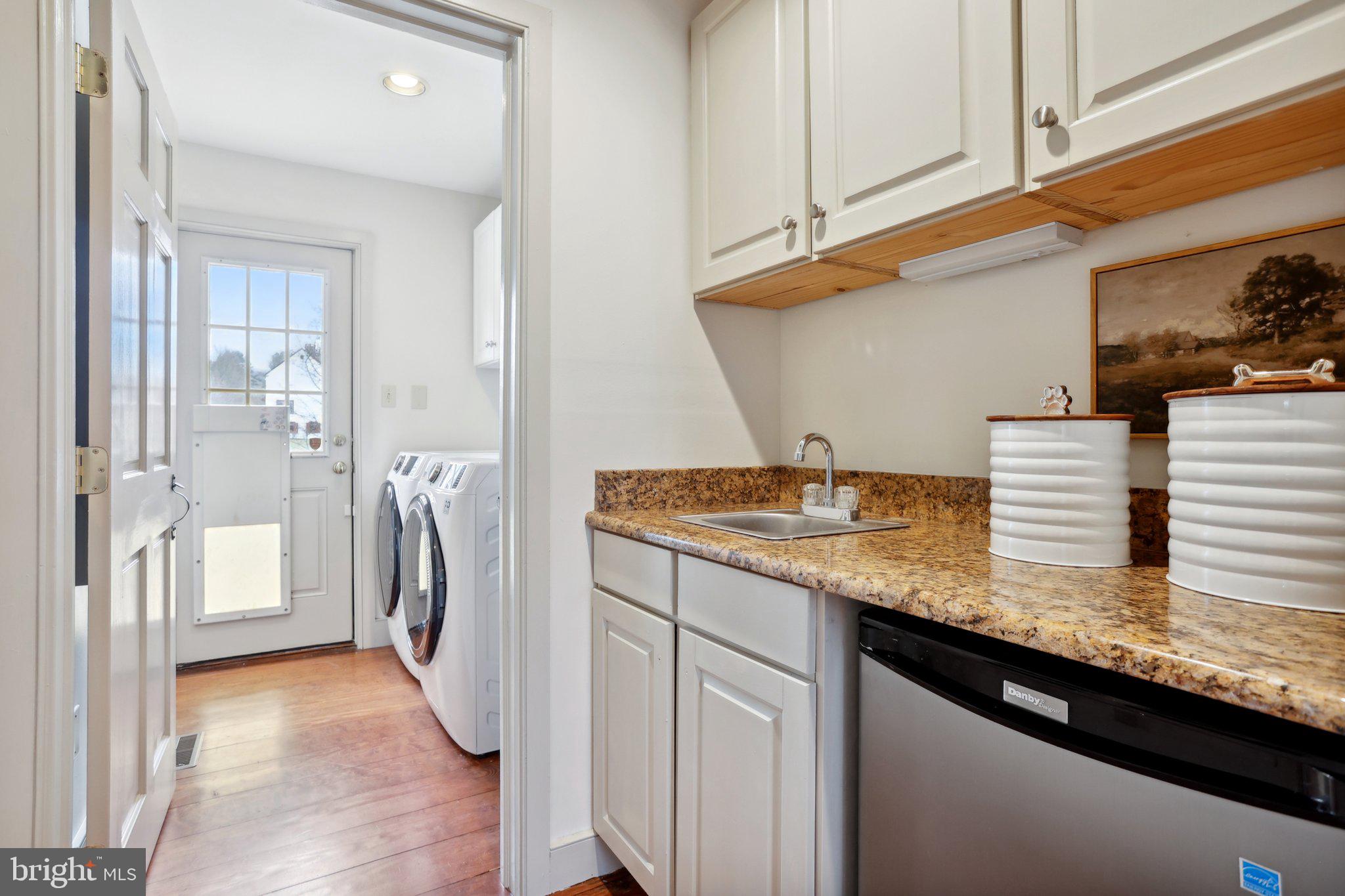 1660 St Peters Road Pottstown, PA 19465 - Photo 20 of 80 a kitchen with a sink a refrigerator and cabinets