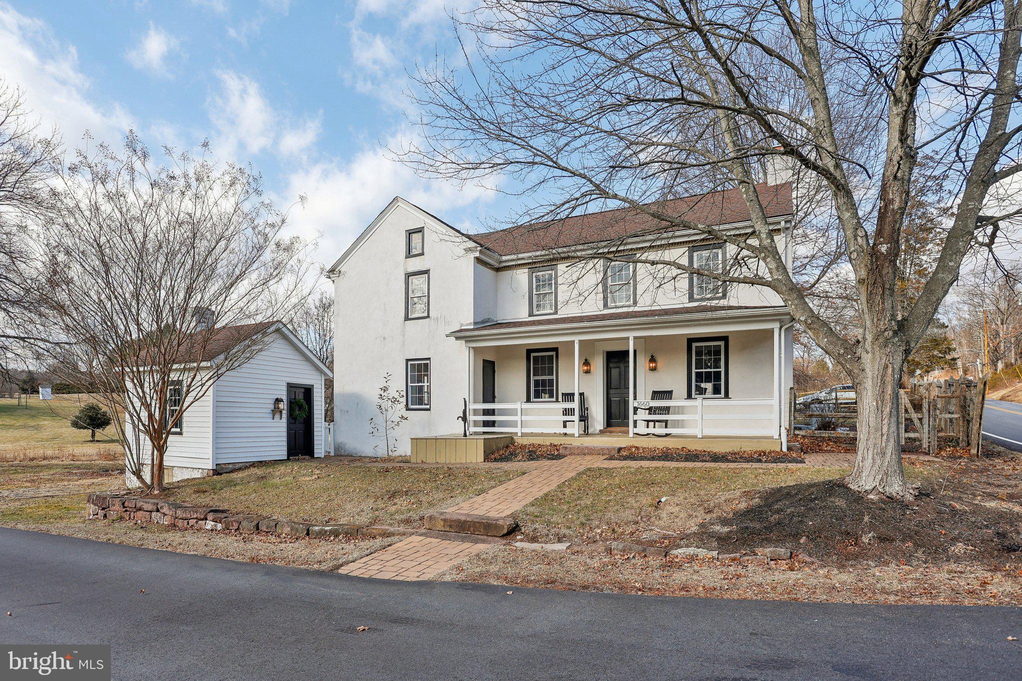 1660 St Peters Road Pottstown, PA 19465 - Photo 3 of 80 a front view of a house with a yard