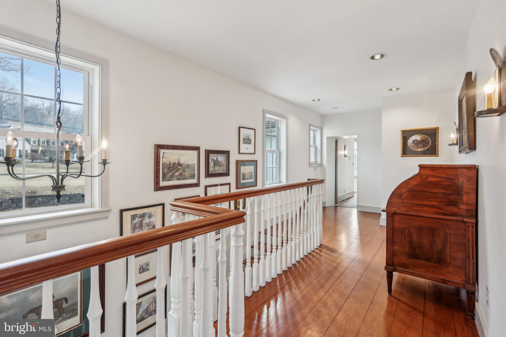 1660 St Peters Road Pottstown, PA 19465 - Photo 31 of 80 a view of a hallway with wooden floor and furniture