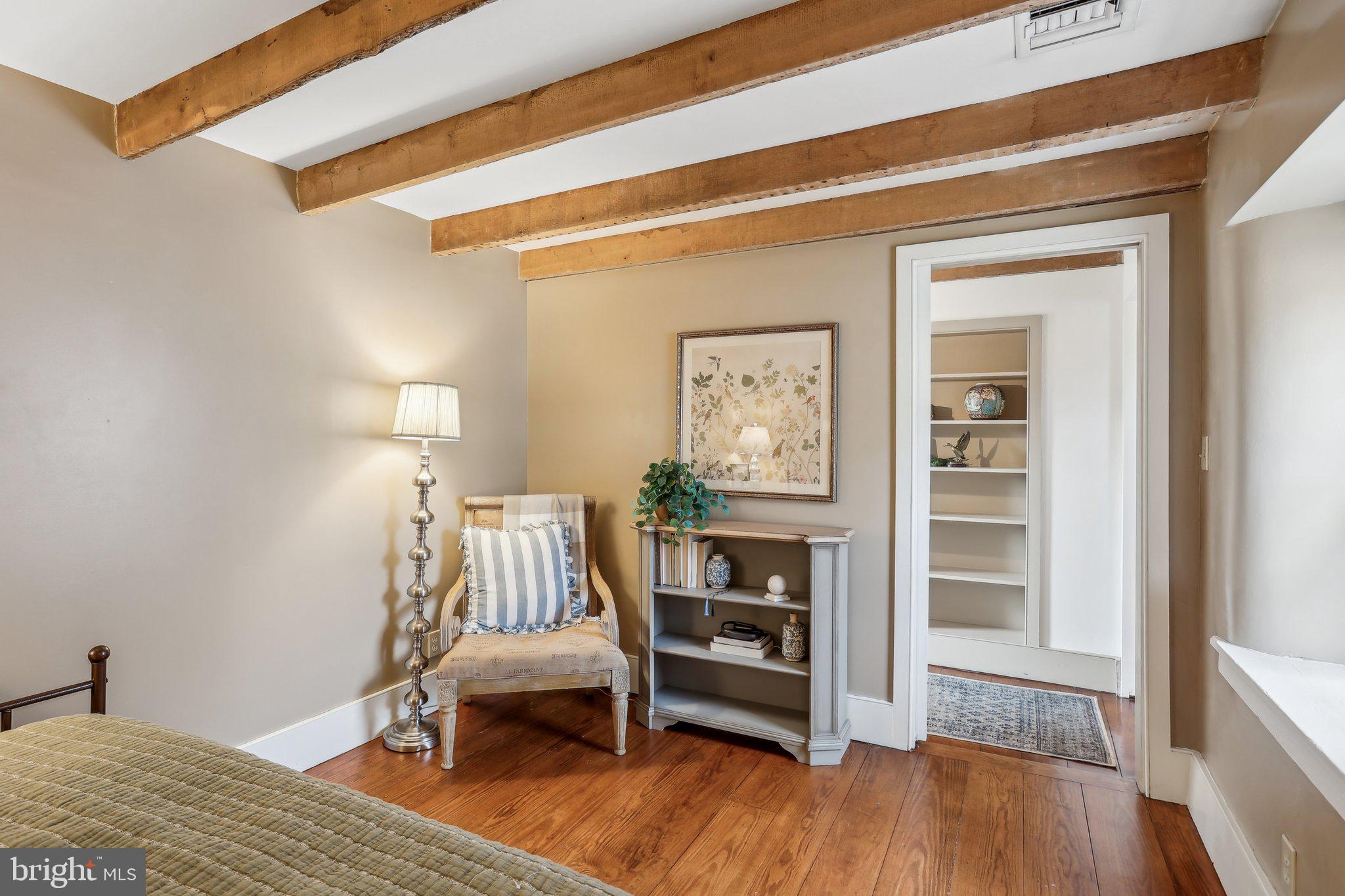 1660 St Peters Road Pottstown, PA 19465 - Photo 44 of 80 a bedroom with furniture and a wooden floor