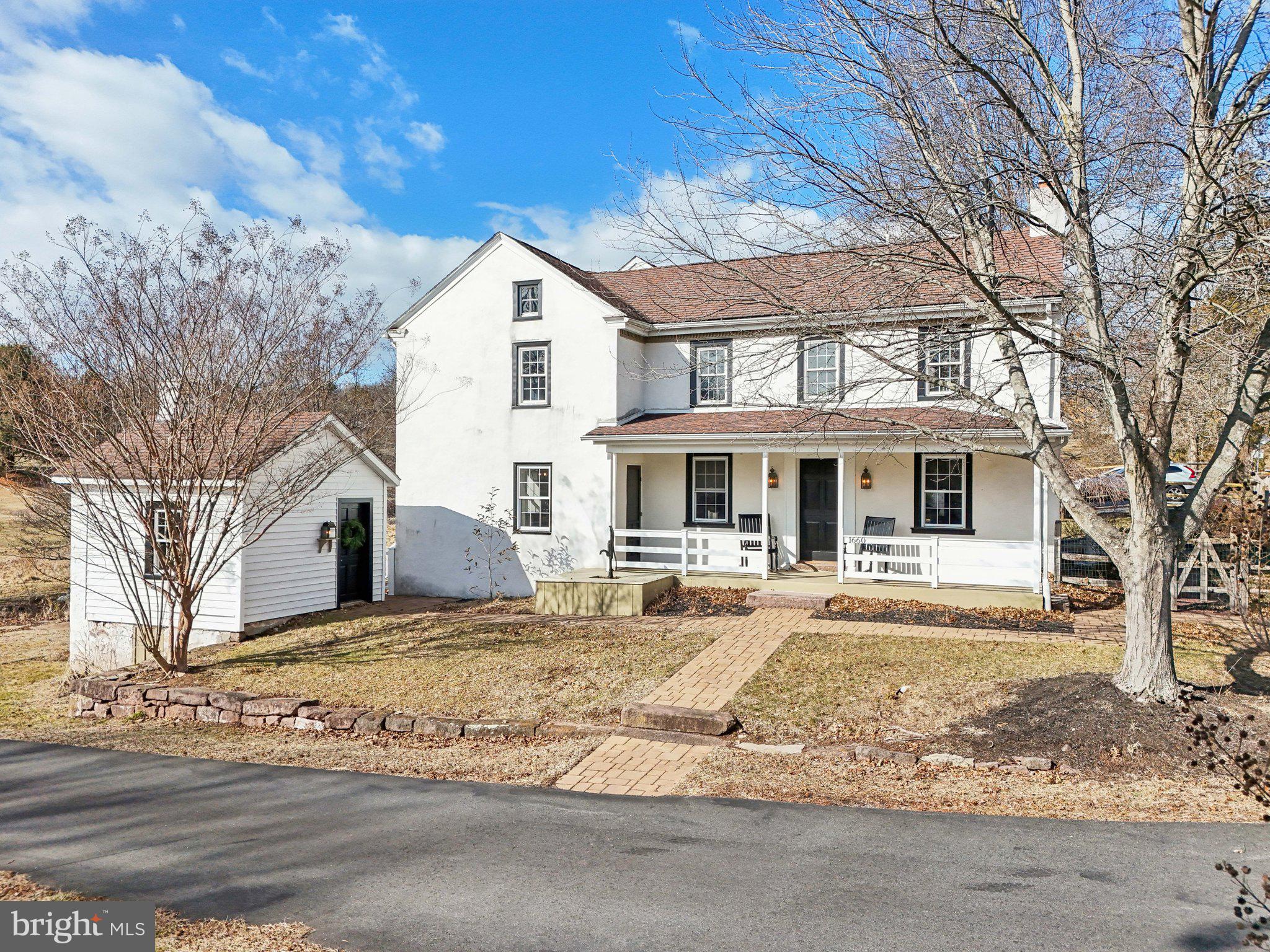 1660 St Peters Road Pottstown, PA 19465 - Photo 56 of 80 a front view of a house with a yard