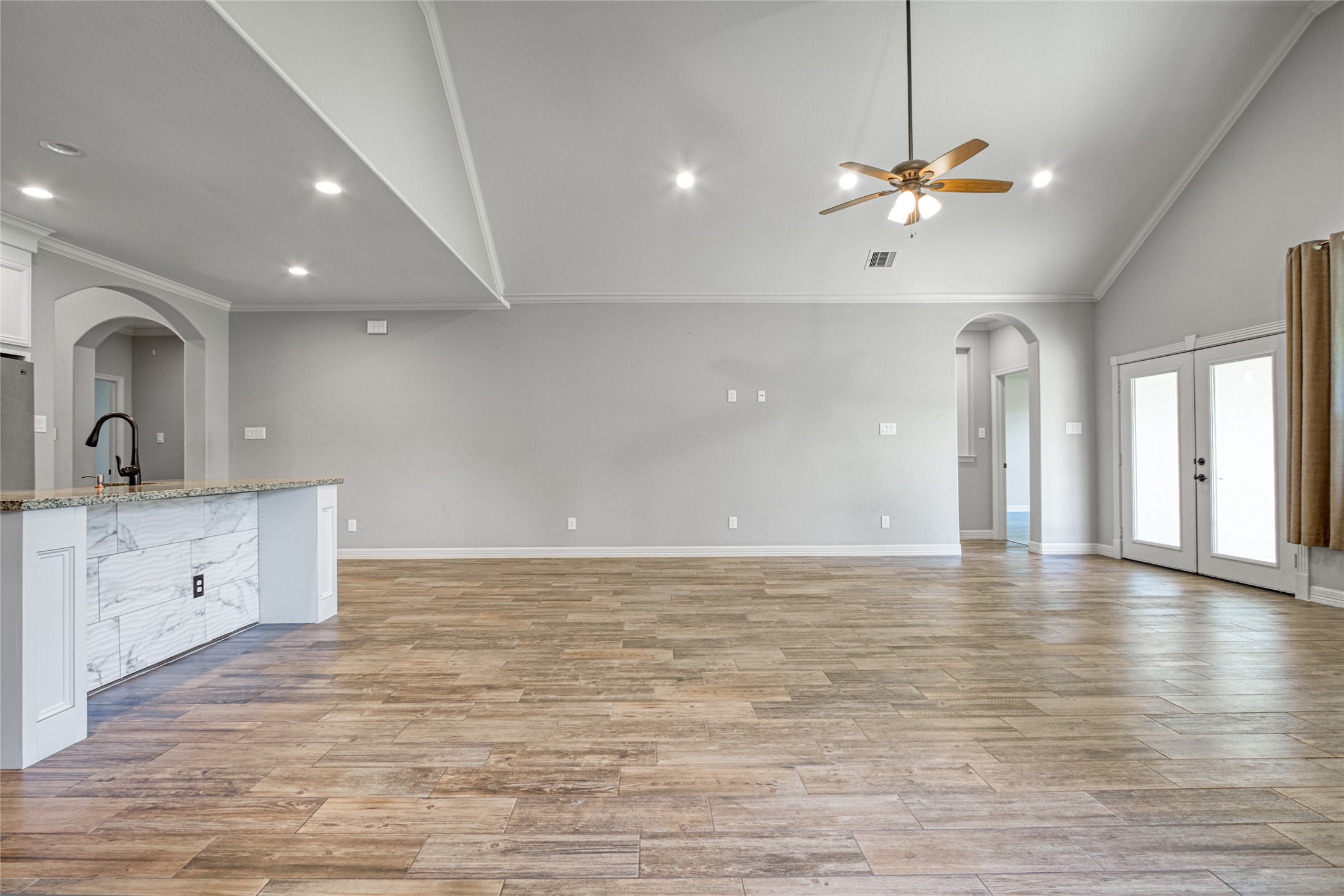 27684 Rio Blanco Drive Splendora, TX 77372 - Photo 12 of 31 a view of an empty room with window and wooden floor