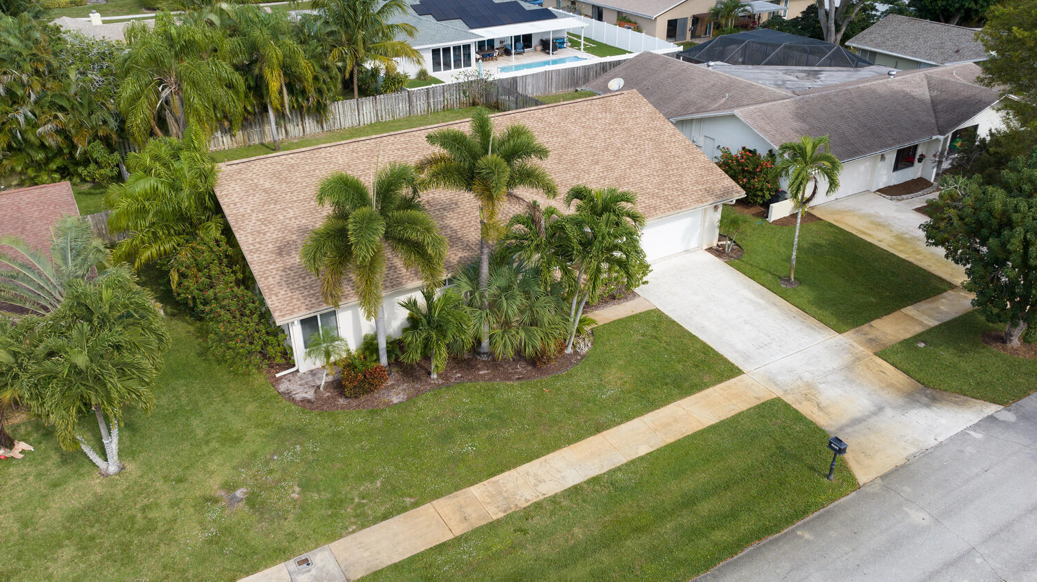 4695 Brandywine Drive Boca Raton, FL 33487 - Photo 28 of 28 a view of a house with a yard