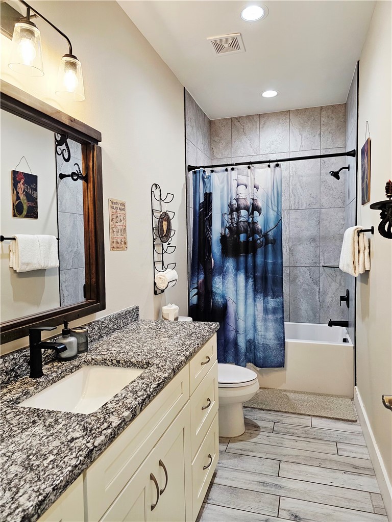122 Ridge Harbor Drive Rockport, TX 78382 - Photo 30 of 34 a bathroom with a sink toilet and shower