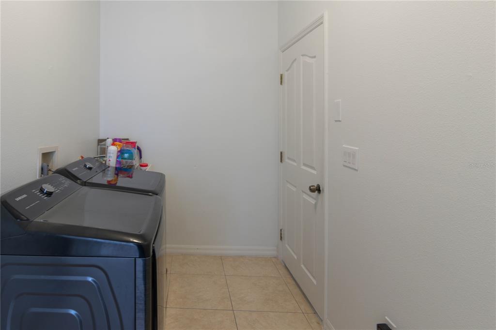 6151 New Osprey Point Weeki Wachee, FL 34607 - Photo 46 of 63 a room with storage and utility