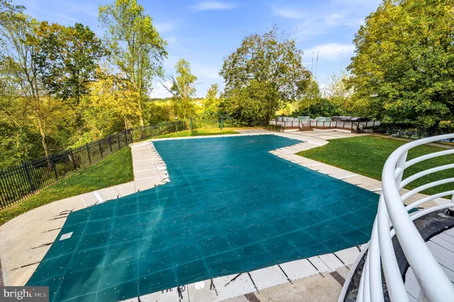 a view of a golf course with a lake