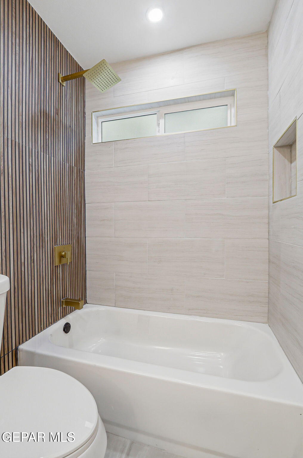 709 Frontera Road El Paso, TX 79922 - Photo 31 of 41 a bathroom with a shower and a bath tub