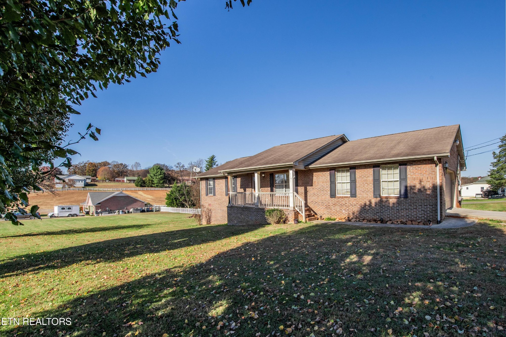 3919 Morganton Road Maryville, TN 37801 - Photo 2 of 29 a front view of a house with a garden