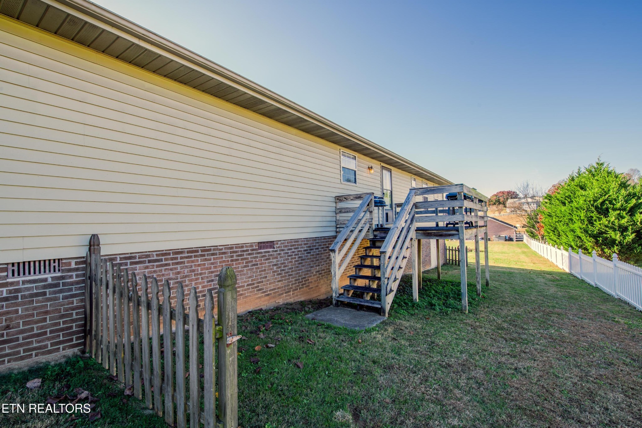 3919 Morganton Road Maryville, TN 37801 - Photo 6 of 29 a view of a patio with a table and chairs