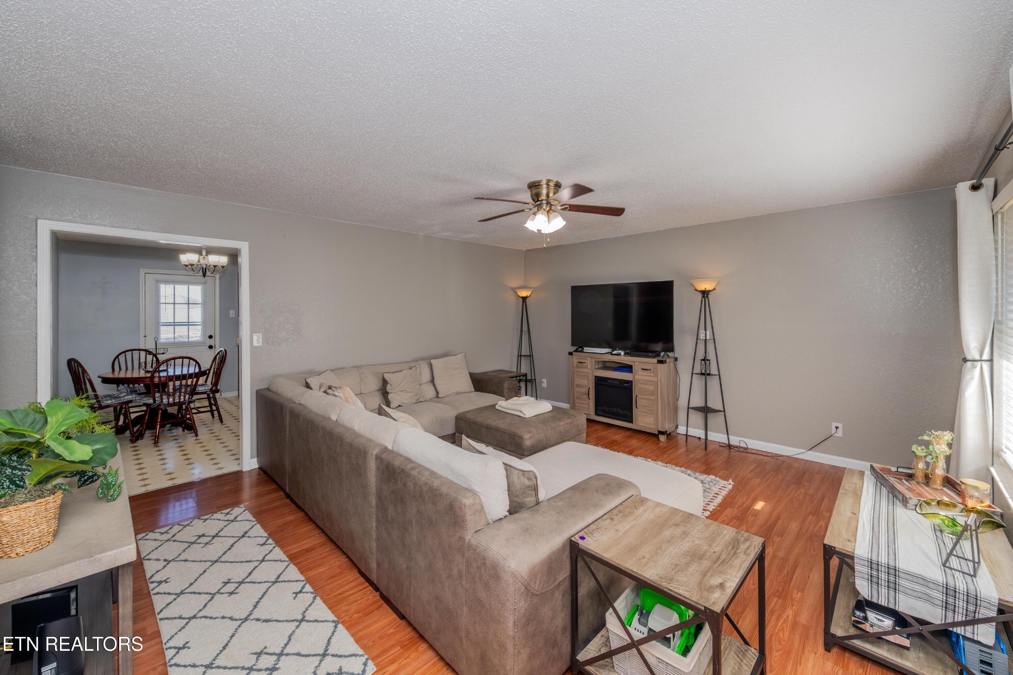 3919 Morganton Road Maryville, TN 37801 - Photo 8 of 29 a living room with furniture and a flat screen tv