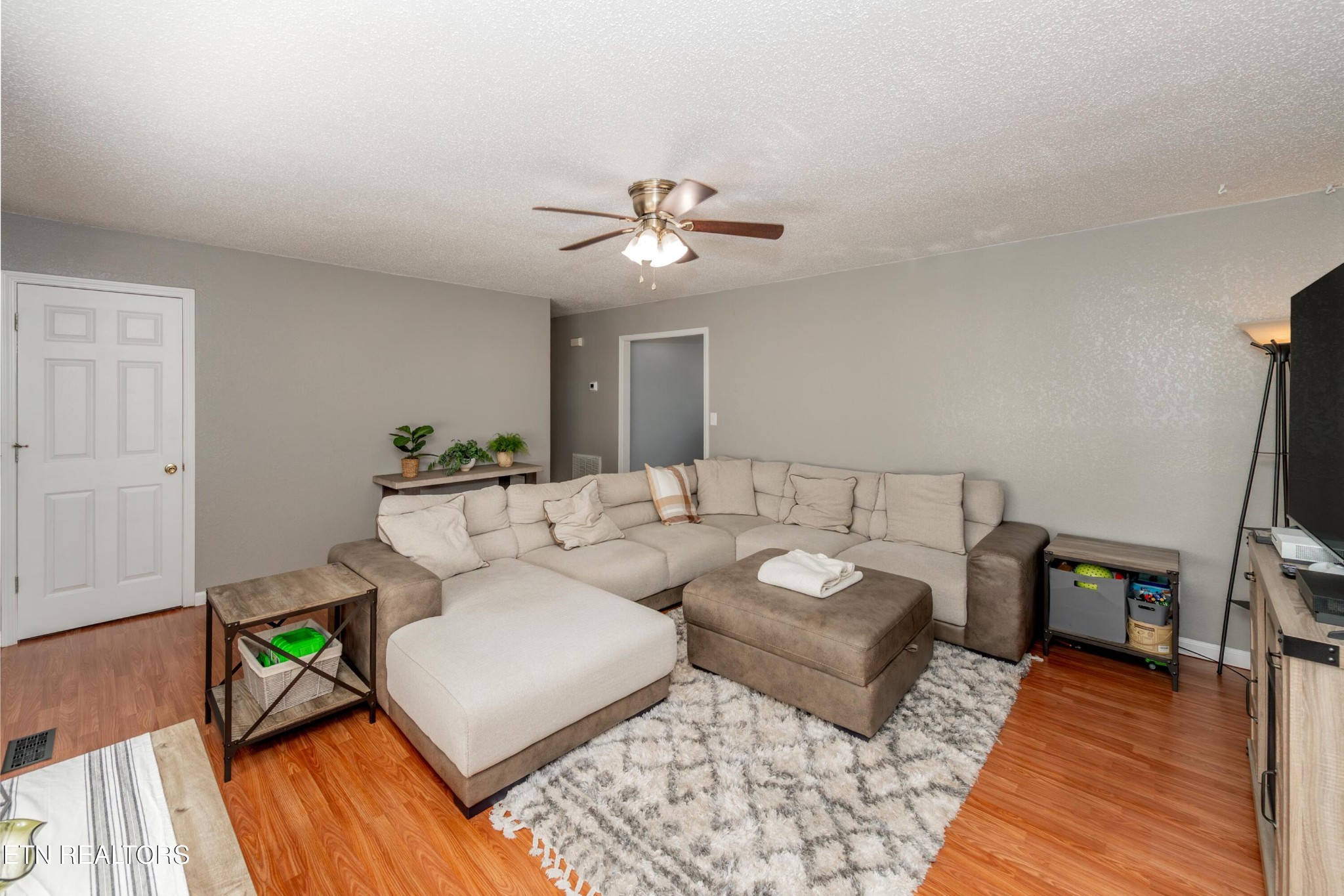 3919 Morganton Road Maryville, TN 37801 - Photo 9 of 29 a living room with furniture and a wooden floor