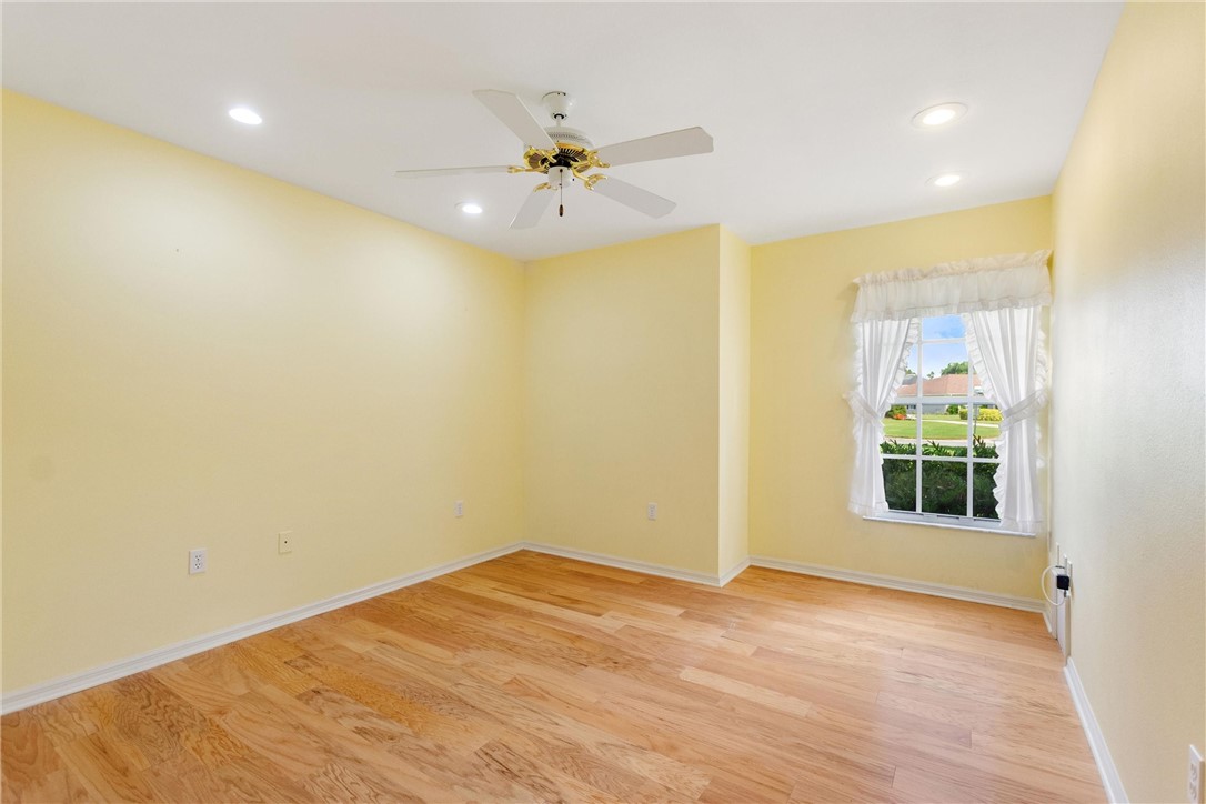 5521 Emerald Ridge Boulevard Lakeland, FL 33813 - Photo 21 of 33 a view of an empty room with a window