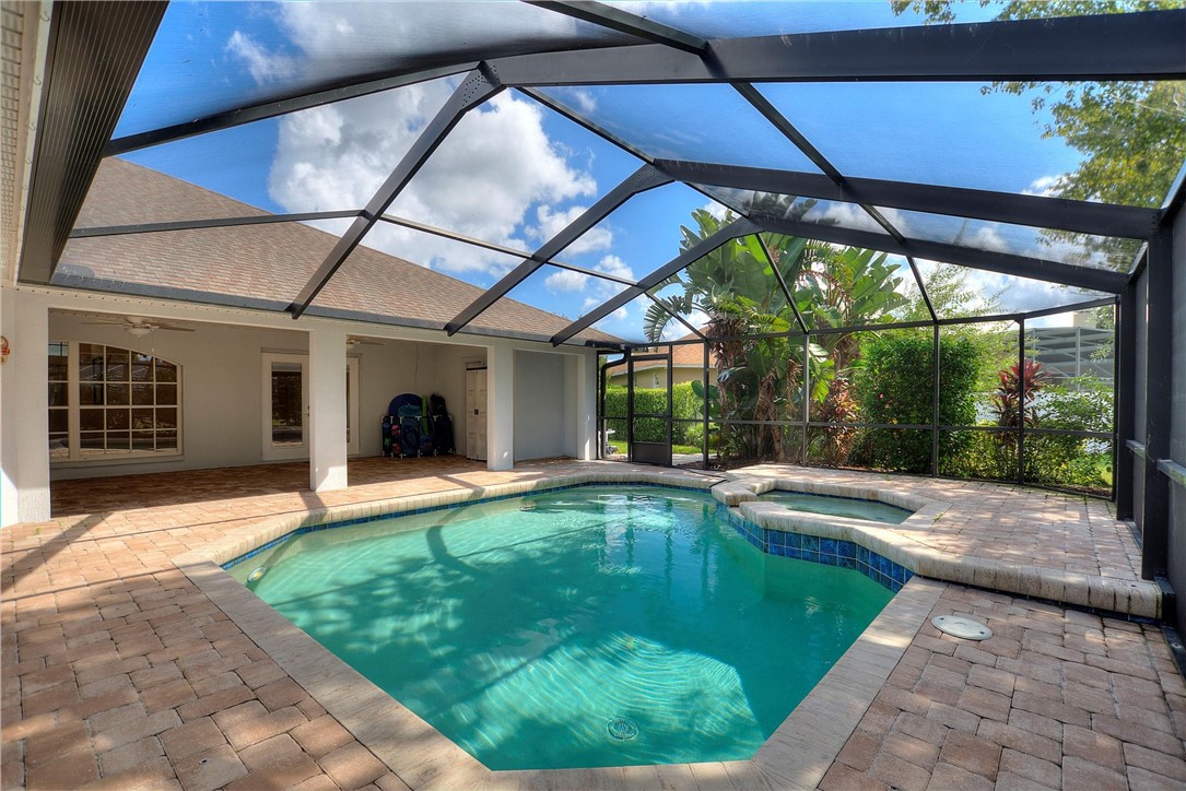 5521 Emerald Ridge Boulevard Lakeland, FL 33813 - Photo 28 of 33 a swimming pool with yard and outdoor seating