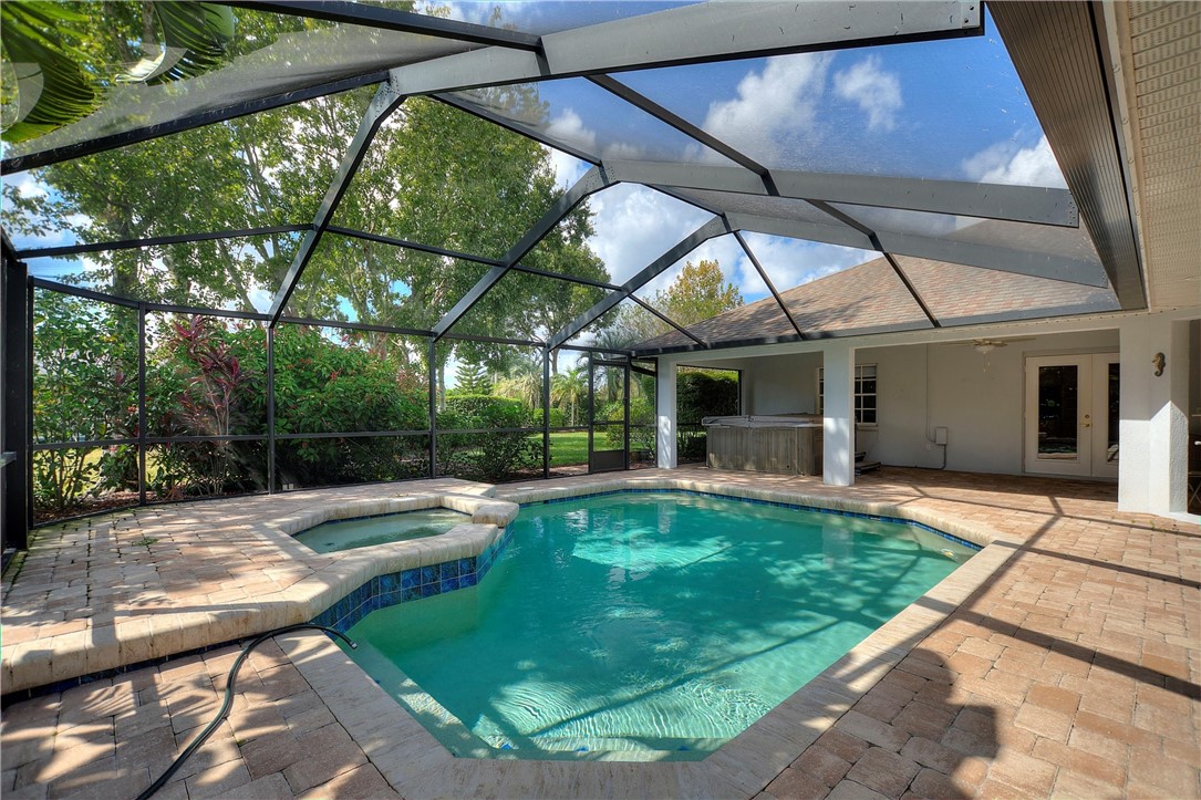 5521 Emerald Ridge Boulevard Lakeland, FL 33813 - Photo 30 of 33 a view of a house with backyard porch and sitting area
