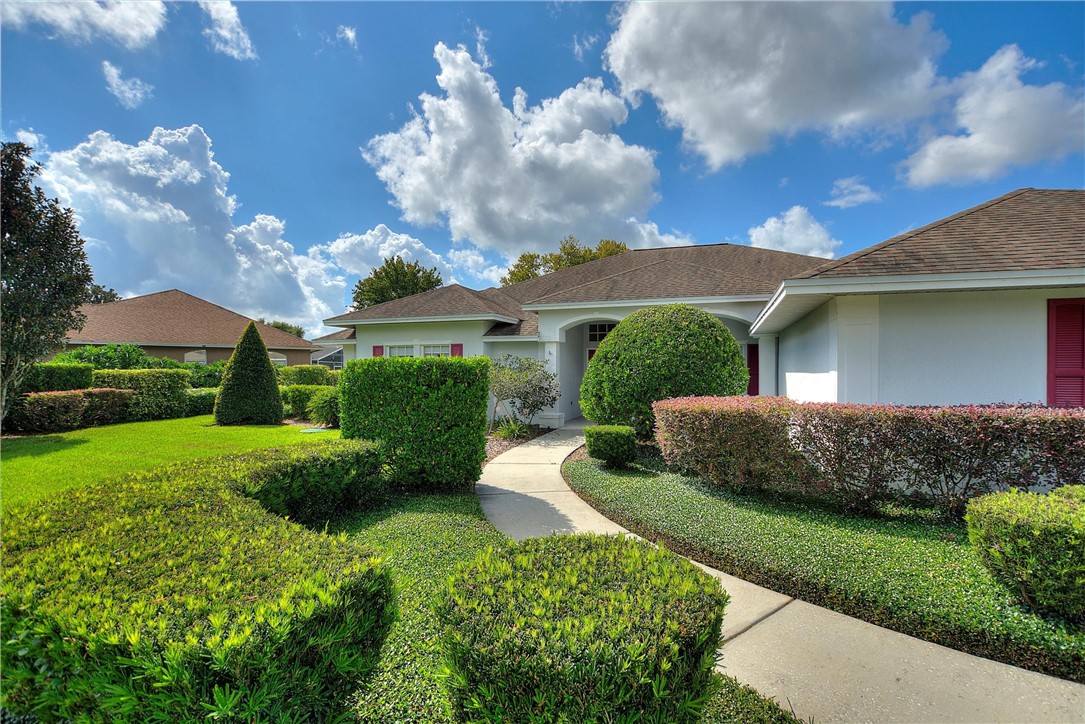 5521 Emerald Ridge Boulevard Lakeland, FL 33813 - Photo 3 of 33 a view of a house with a yard