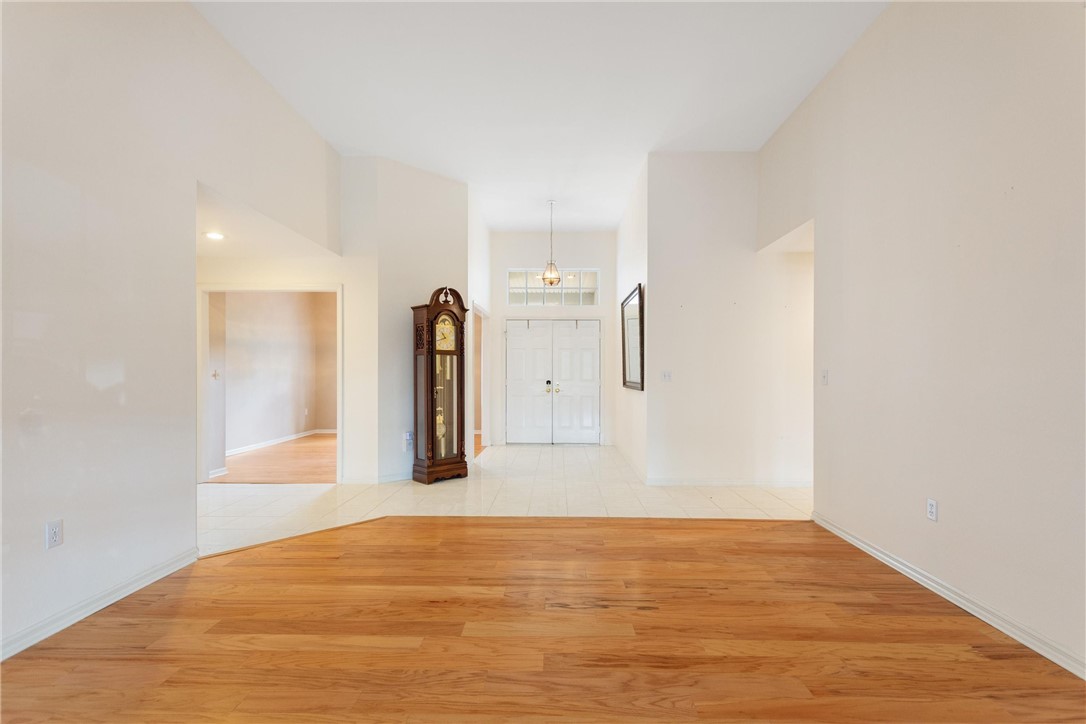 5521 Emerald Ridge Boulevard Lakeland, FL 33813 - Photo 4 of 33 a view of a room with wooden floor