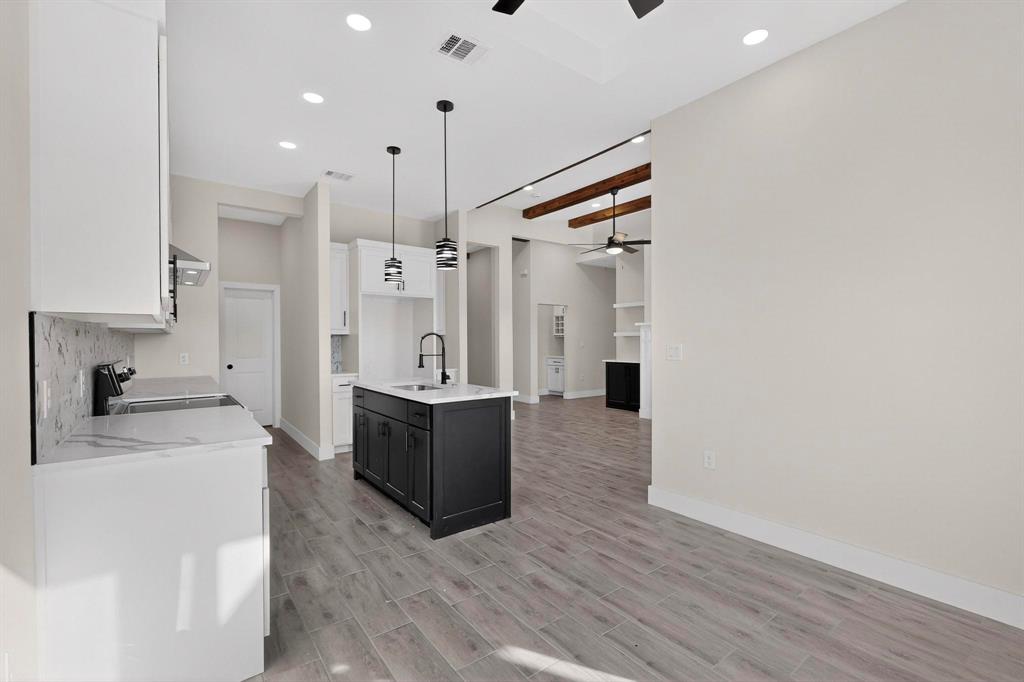 100 Diamond T Ranch Road Trinidad, TX 75163 - Photo 12 of 36 a large kitchen with a lot of counter space and a refrigerator