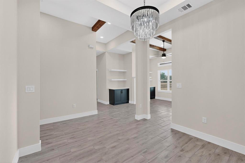 100 Diamond T Ranch Road Trinidad, TX 75163 - Photo 14 of 36 a view of a livingroom with wooden floor