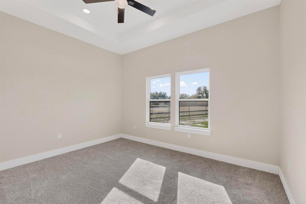100 Diamond T Ranch Road Trinidad, TX 75163 - Photo 18 of 36 an empty room with a empty space and windows