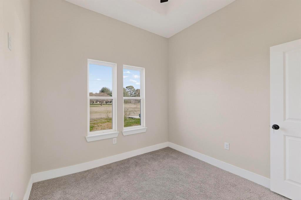 100 Diamond T Ranch Road Trinidad, TX 75163 - Photo 22 of 36 an empty room with windows