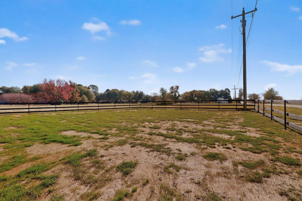 100 Diamond T Ranch Road Trinidad, TX 75163 - Photo 36 of 36 a view of a lake with houses in the background