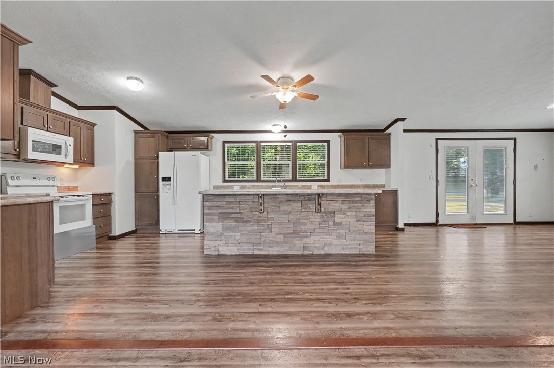 3424 Painesville Warren State Road Southington, OH 44470 - Photo 17 of 50 3424 Painesville Warren Rd, Southington, OH 44470 – Enjoy comfortable one-floor living in this well-maintained home built in 2018. Featuring 3 bedrooms, 2 full bathrooms, and an open-concept layout, this home offers both functionality and convenience. The spacious kitchen, dining, and living areas provide plenty of room for everyday living and entertaining. A large garage offers ample space for vehicles, storage, hobbies, or workshop needs. Situated on a generous lot with a welcoming front porch, this property combines modern living with a peaceful country setting. Move-in ready and waiting for its next owner!