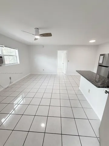 a view of a kitchen with a sink