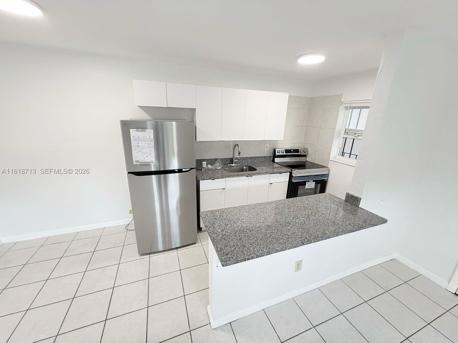 100 Northeast 78th Street, Unit 9 Miami, FL 33138 - Photo 7 of 15