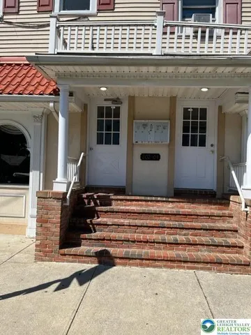 a front view of a house with entryway