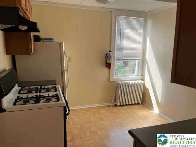 a room with furniture and window