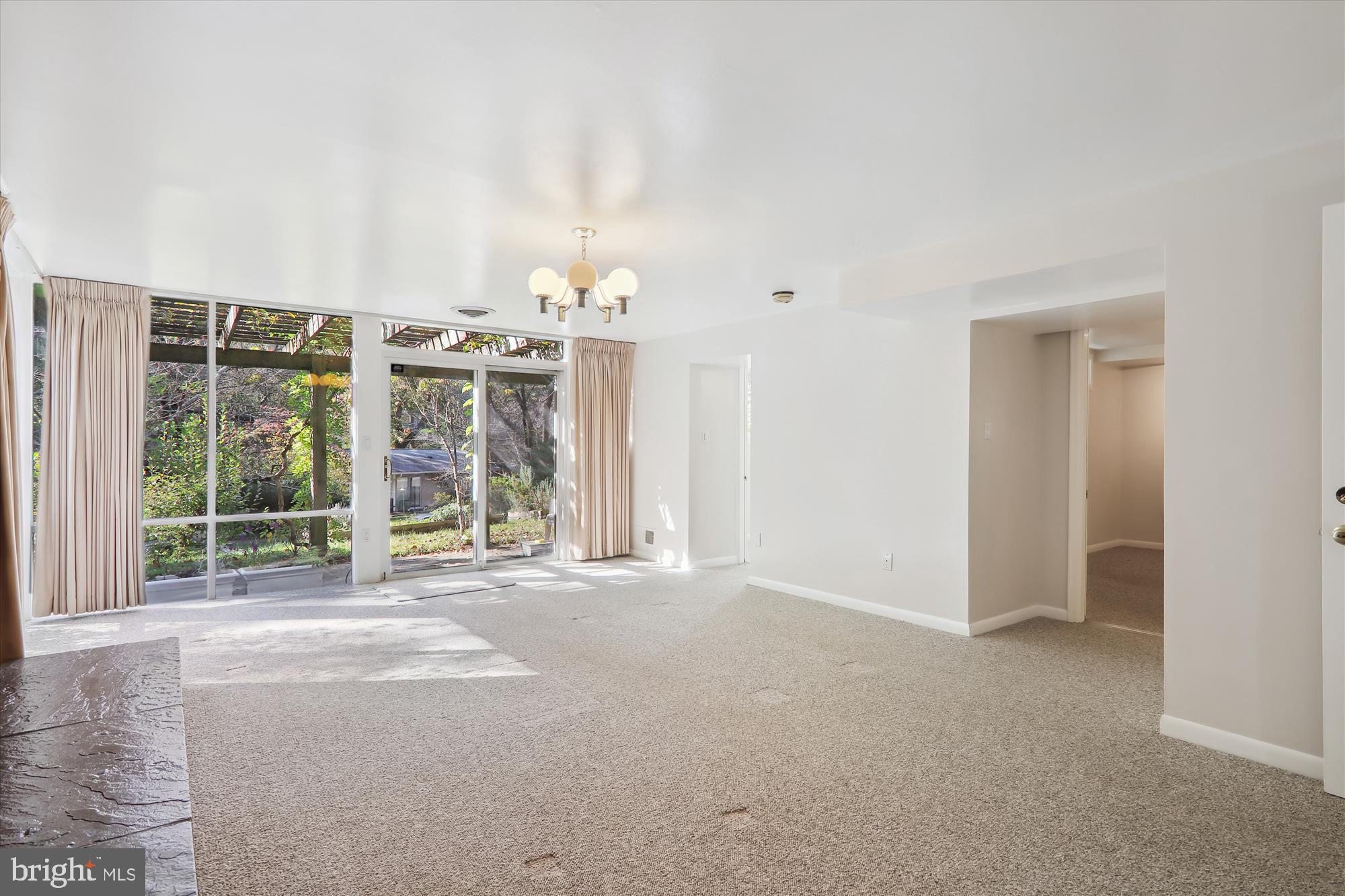 3913 Rickover Road Silver Spring, MD 20902 - Photo 24 of 43 A sliding door takes you to the front patio