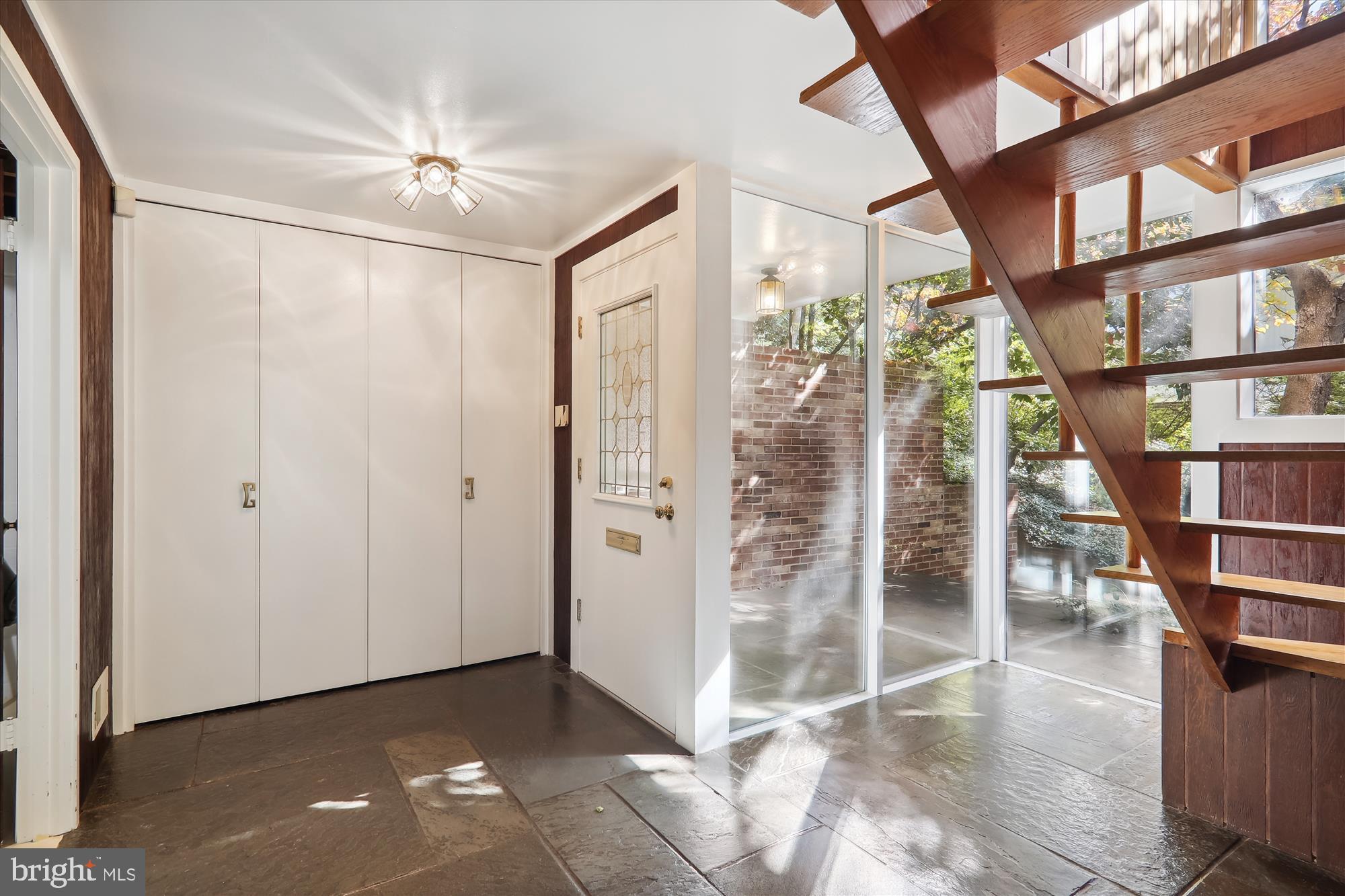3913 Rickover Road Silver Spring, MD 20902 - Photo 5 of 43 Spacious foyer w. the iconic floating stair case